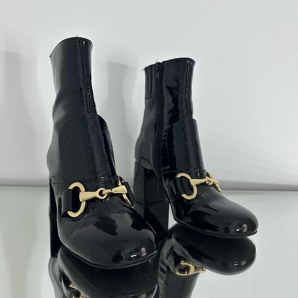 Elegant Black Ankle Boots with Gold Detail